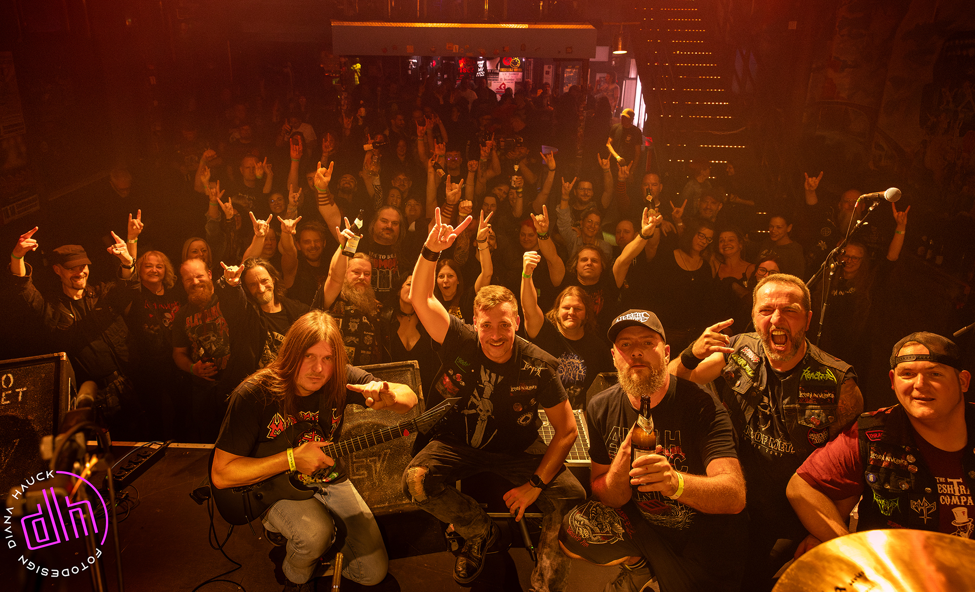 Band with crowd in the background from lessons in metal 5